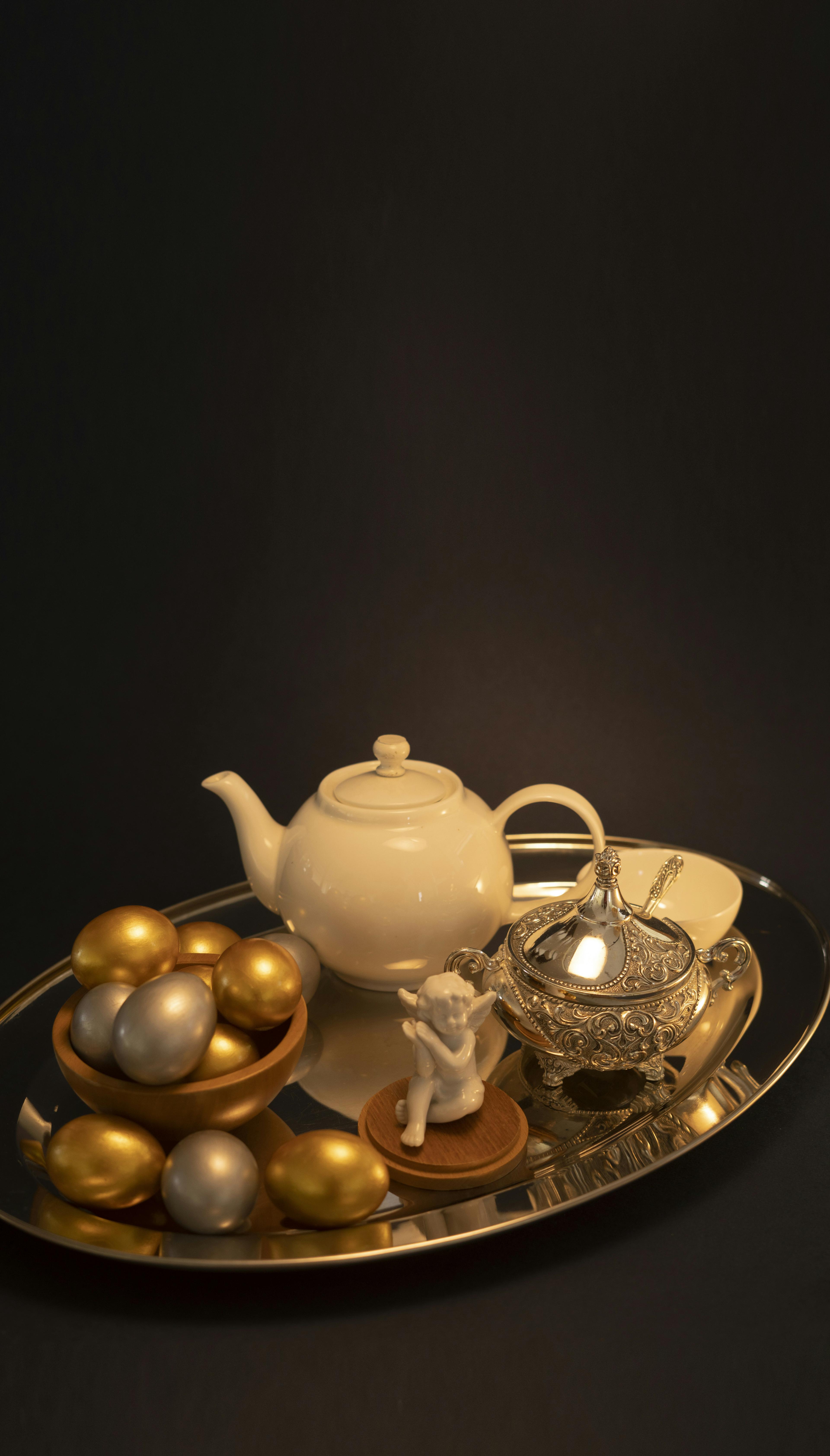 Complete Edwardian sterling silver tea service with teapot, creamer, and sugar bowl