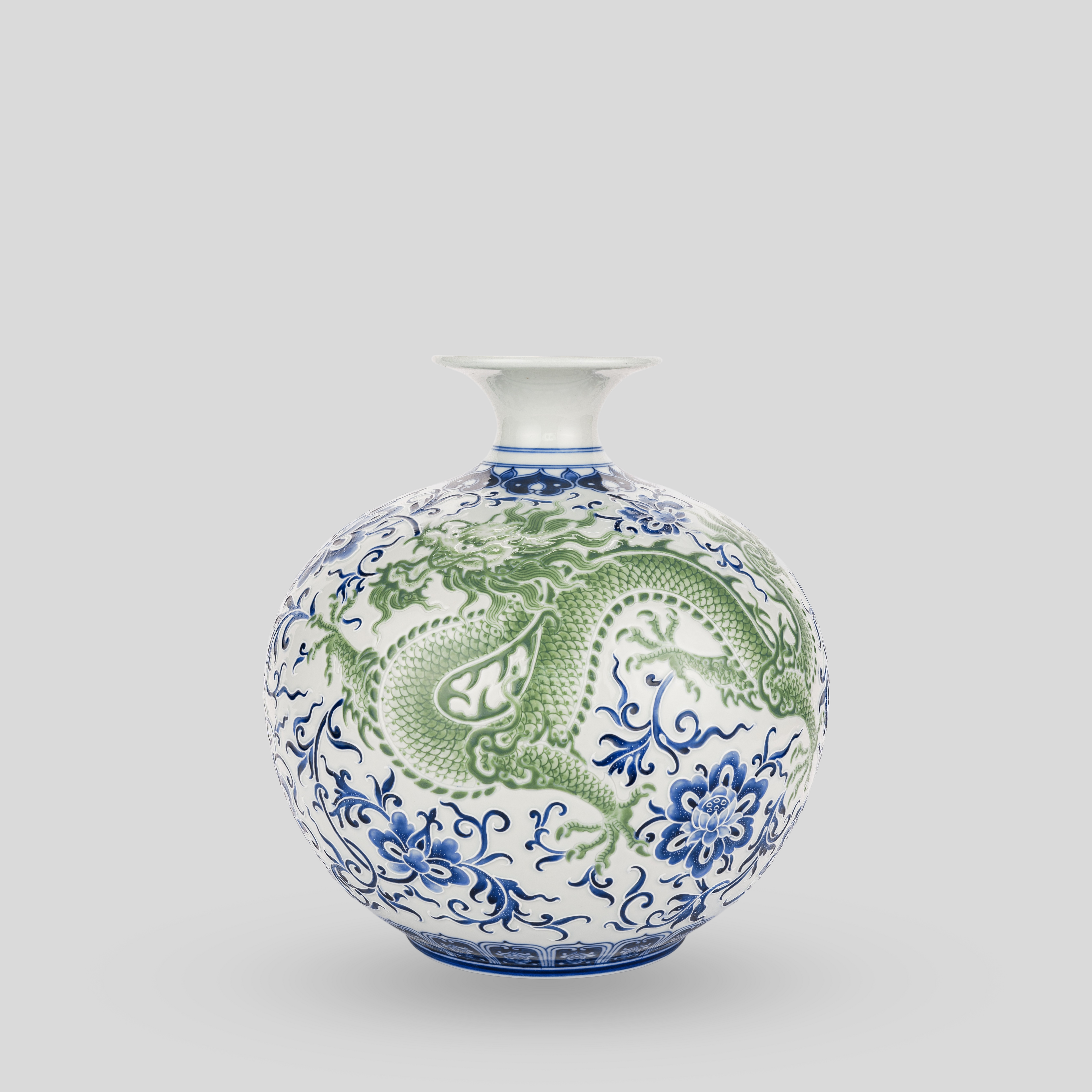 Blue and white Chinese porcelain vase with dragon motif and floral patterns